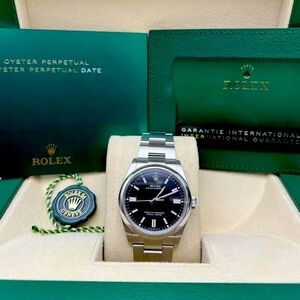 Rolex Oyster Perpetual Black Baton Dial Box Papers